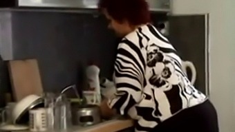 A Plump Granny With Curves Gets Intimate In The Kitchen