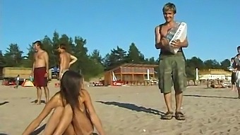 A Young And Attractive Teen Enjoys Nude Activities At The Beach
